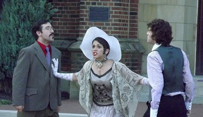 Silvia (Hillary Wheelock) separates suitors Thurio (Steven Schuerger) and Valentine (Joseph Dunn) in Two Gentlemen of Verona
