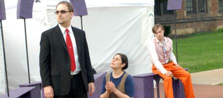 Isabella (Faith Whitacre) pleads to Angelo (Justin Brenis) while friend Lucio (Kyle Huff) looks on in Measure for Measure