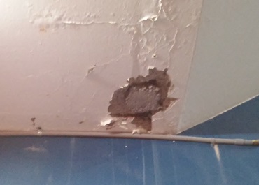 Frangos garage stair hole.jpg